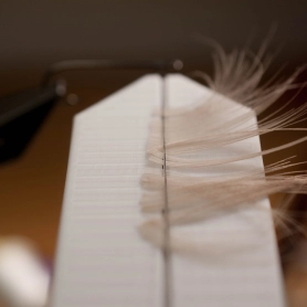 Caught with the top thread Caught with the top thread